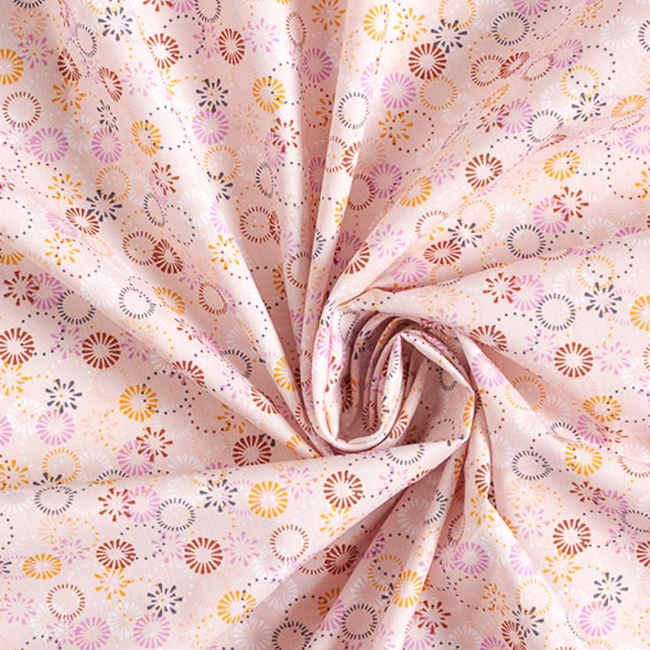 Tissu fond rose feu d'artifices